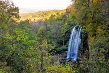 Appalachian Mountains Falling Spring Waterfall And Green Yellow Forest Trees In Rural Countryside Autumn In Covington, Virginia