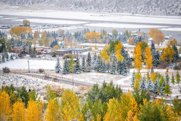 Wall Mural - Aspen, Colorado town in rocky mountains roaring fork valley high angle view of airport during autumn season and snow in October 2019