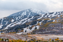 Aspen, Colorado USA City With Buttermilk Ski Slope In Rocky Mountains View Of Storm Clouds And Small Airport Runway In Roaring Fork Valley