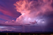 Dramatic sky with thunderstorm cumulonimbus clouds at sunset