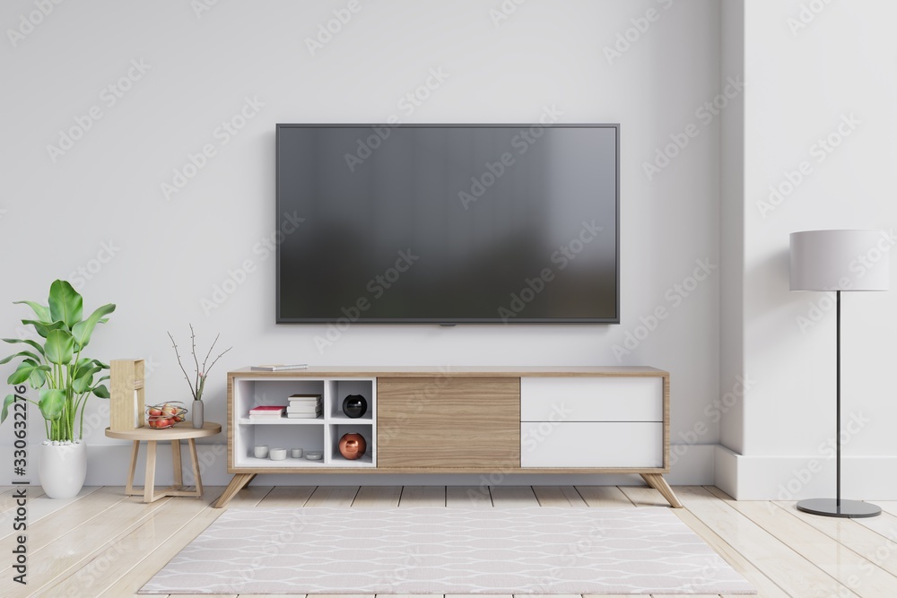 TV on the cabinet in modern living room with plant on white wall background. - obrazy, fototapety, plakaty 