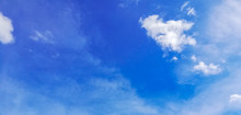 Background Of Blue Sky With White Clouds