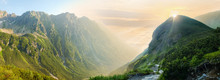 Deep Mountain Valley In Morning Sunlight, Panoramic View