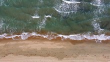 Top View Shot Of Ocean Waves Crushing On The Shore