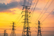 © zhao dongfang - Industrial high voltage electricity tower and beautiful nature landscape at summer sunset