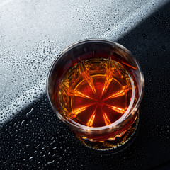 Wall Mural - whiskey on a cold and wet surface