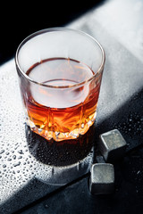 Wall Mural - whiskey on a cold and wet surface