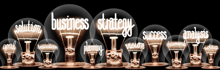 Wall Mural - Light Bulbs with Business Strategy Concept