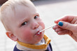 © makam1969 - cheerful little child eating ice cream outdoors