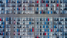Aerial View New Cars Parking For Sale Stock Lot Row, New Cars Dealer Inventory Import Export Business Commercial Global, Automobile And Automotive Industry Distribution Logistic Transport Worldwide.