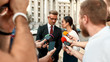 © Svitlana - It's time to consult. Journalists conducting interview of politician. Journalism industry, live streaming concept.