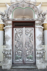 Wall Mural - Beautiful antique silver door in Chiang Mai, Thailand. Traditional national old Thai architecture. Landmark, sight, ancient attraction, architectural monument of Chiang Mai town, Thailand. Entrance