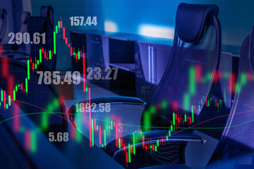 stock quotes and charts on the background of office furniture. work of a stock broker. the offer of 