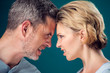 © Aleksej - A portrait of angry couple staying face to face. People and emotions concept