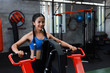 © chayathon2000 - Asian woman in fitness gym