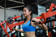 © chayathon2000 - Asian woman in fitness gym