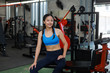 © chayathon2000 - Asian woman in fitness gym