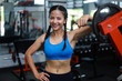 © chayathon2000 - Asian woman in fitness gym
