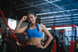 © chayathon2000 - Asian woman in fitness gym