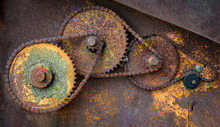 Gears And Chains On Old Abandoned Farm Equipment
