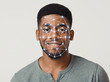 © Prostock-studio - Cyber safety concept. Facial scanning of African American guy on light background