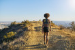 © Joshua Resnick - fit african american woman walking at the top of runyon canyon in los angeles