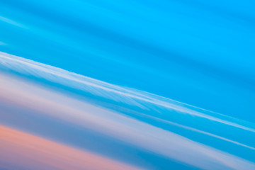 Wall Mural - varicolored striped surreal sky with shades of blue, cyan, cobalt, pink colors. diagonal lines of sm