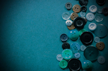 Many colored buttons on a blue background.