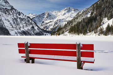 Wall Mural - Red bench on Vilsalpsee (Tannheim, Tyrol, Austria)