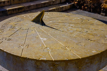 Old Stone Sundial With A Shadow