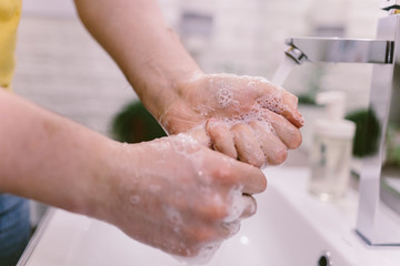  Corona virus hands hygiene coronavirus spreading pandemic prevention header. China outbreak doctor wearing face mask versus man washing hands rubbing soap using hand sanitizer gel