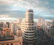 © Diego - Gran via street with traffic and people and Callao Square, main shopping street in Madrid. Spain, Europe