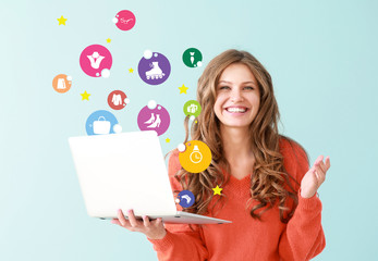 Sticker - Portrait of happy young woman with laptop on color background