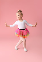Cute Little Ballerina On Color Background
