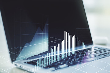 Abstract creative financial graph on modern laptop background, forex and investment concept. Multiexposure