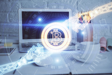 multi exposure of blockchain and crypto economy theme hologram and table with computer background. c