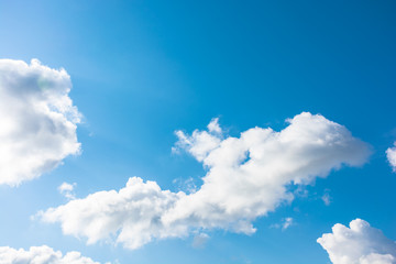 Wall Mural - gorgeous cloudscape in springtime. weather background with dynamic cloud arrangement on a blue sky. 