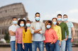 © Syda Productions - health, safety and pandemic concept - international group of people wearing protective medical mask for protection from virus disease over coliseum in rome, italy background