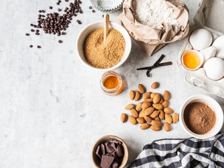 Wall Mural - Cooking flat lay of various food ingredients for baking on a white background. Copy space. Top view. Baking concept. Mockup.