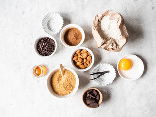 Wall Mural - Cooking flat lay of various food ingredients for baking on a white background. Top view. Baking concept.