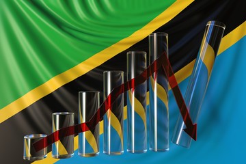 Glass bar chart with downward trend against flag of Tanzania. Financial crisis or economic meltdown related conceptual 3D rendering