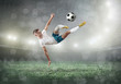 © Andrii IURLOV - Soccer player on a football field in dynamic action at summer da