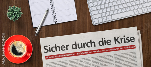 Fotografía Zeitung auf Schreibtisch - Sicher durch die Krise