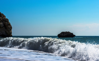 waves crashing on rocks