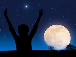 Wall Mural - woman enjoying starry night with arms wide open.