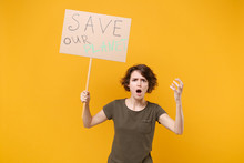 Shocked Irritated Protesting Woman Hold Protest Sign Broadsheet Placard On Stick Spreading Hands Isolated On Yellow Background. Stop Nature Garbage Ecology Environment Protection Concept. Save Planet.