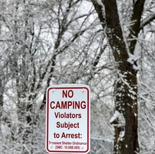 No Camping - Violators Subject To Arrest Sign Posted - Scenic Winter View In Background