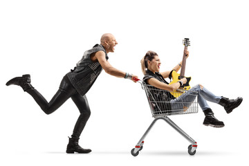 Poster - Punk shouting and pushing a shopping cart with a woman playing a guitar inside