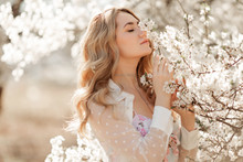 Pretty Woman In Blossom Spring Garden