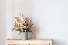 Minimalistic Composition Of Dried Flowers In Cylindrical Ceramic Vase As Home Decoration.